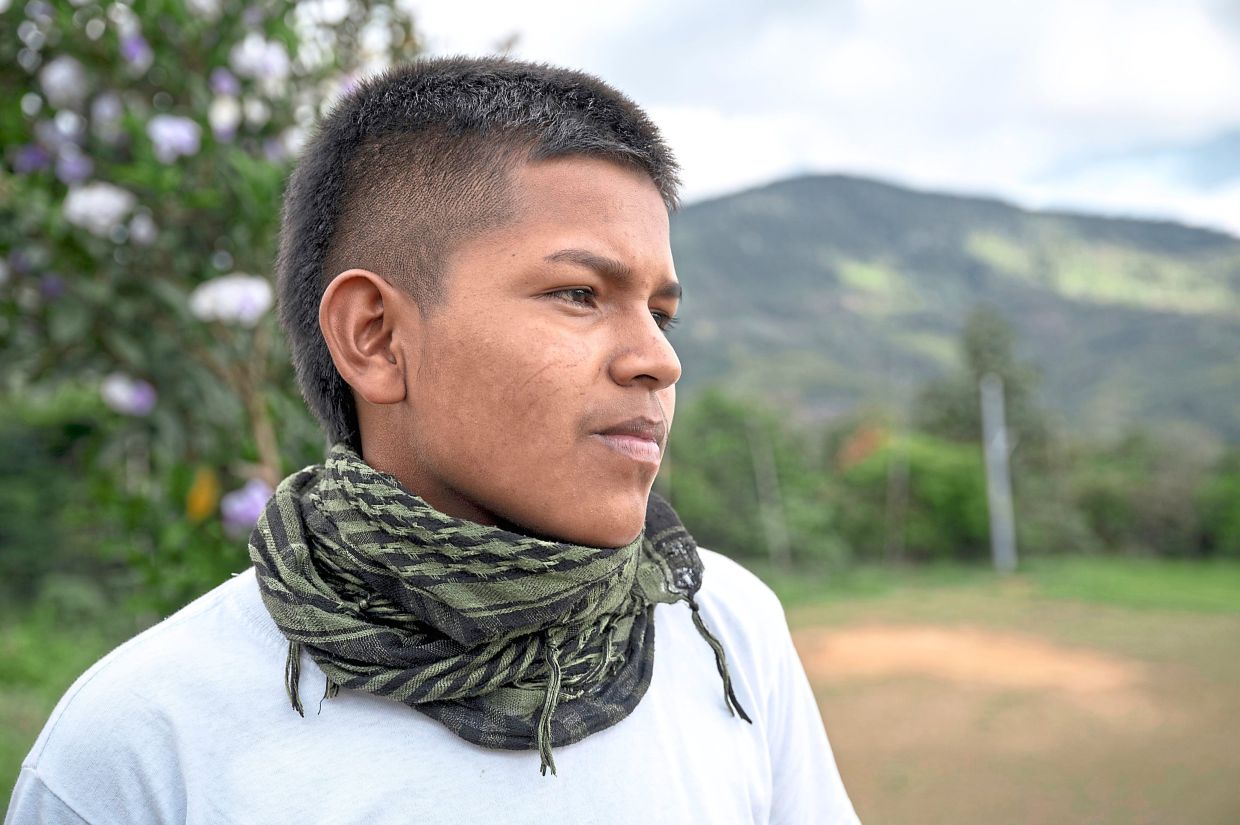 Camago, from the Lopez Adentro Indigenous reserve, serves in the Indigenous Guard.