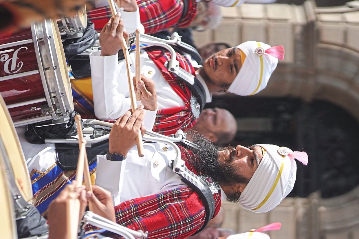 Tripert (right) says it has taken a year of planning and rehearsals to prepare for the DFP concert. Photo: Sri Dasmesh Pipe Band