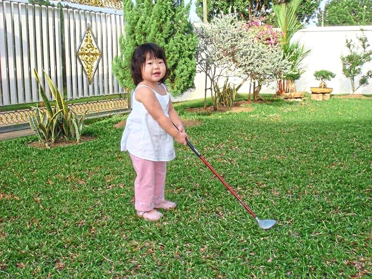 Mirabel picking up golf at age three, inspired by her father and grandfather.