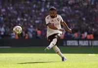 Soccer-Salah wins PFA Player of the Year award for unprecedented third time