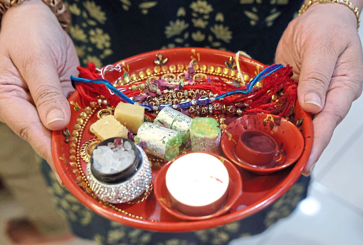 A tray of sweets and lights used for the ‘aarti’ ritual during the ‘rakhi’-tying ceremony.