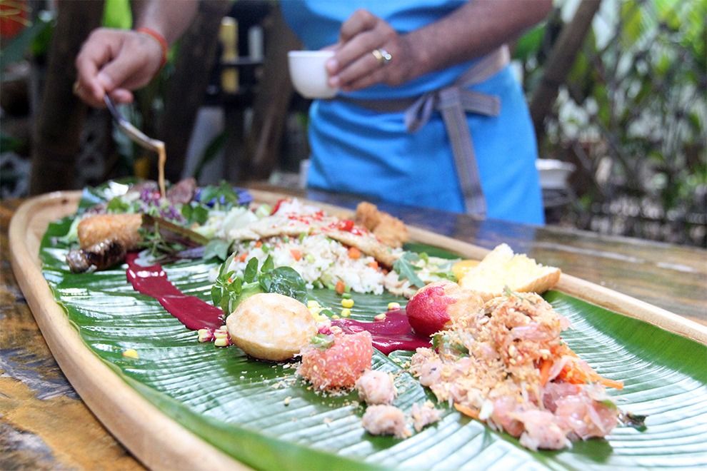 Chef Mork Mengly shares his ‘Cambodia Food Journeys on Banana Leaf’ with his guests. - Hong Raksmey