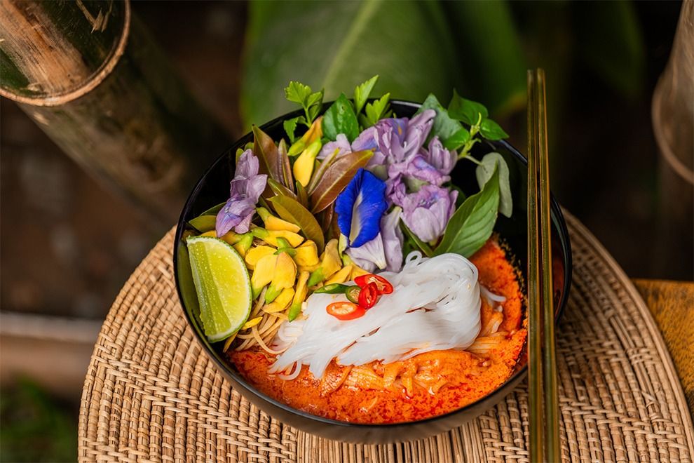 Khmer noodle soup with crab meat and vegetables. - Supplied