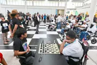 Giant chess game spotlights SMA