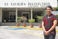 Female principal makes history in taking SXI helm