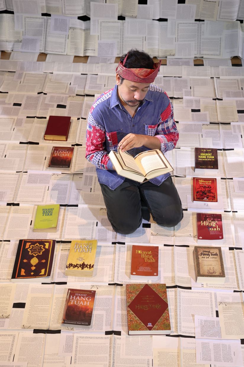 Faiq takes the spotlight in 'Fragments Of Tuah', a layered collage of archival texts, schoolbooks, songs, state slogans, invented memories, and historical erasures. Photo: The Star/Art Chen