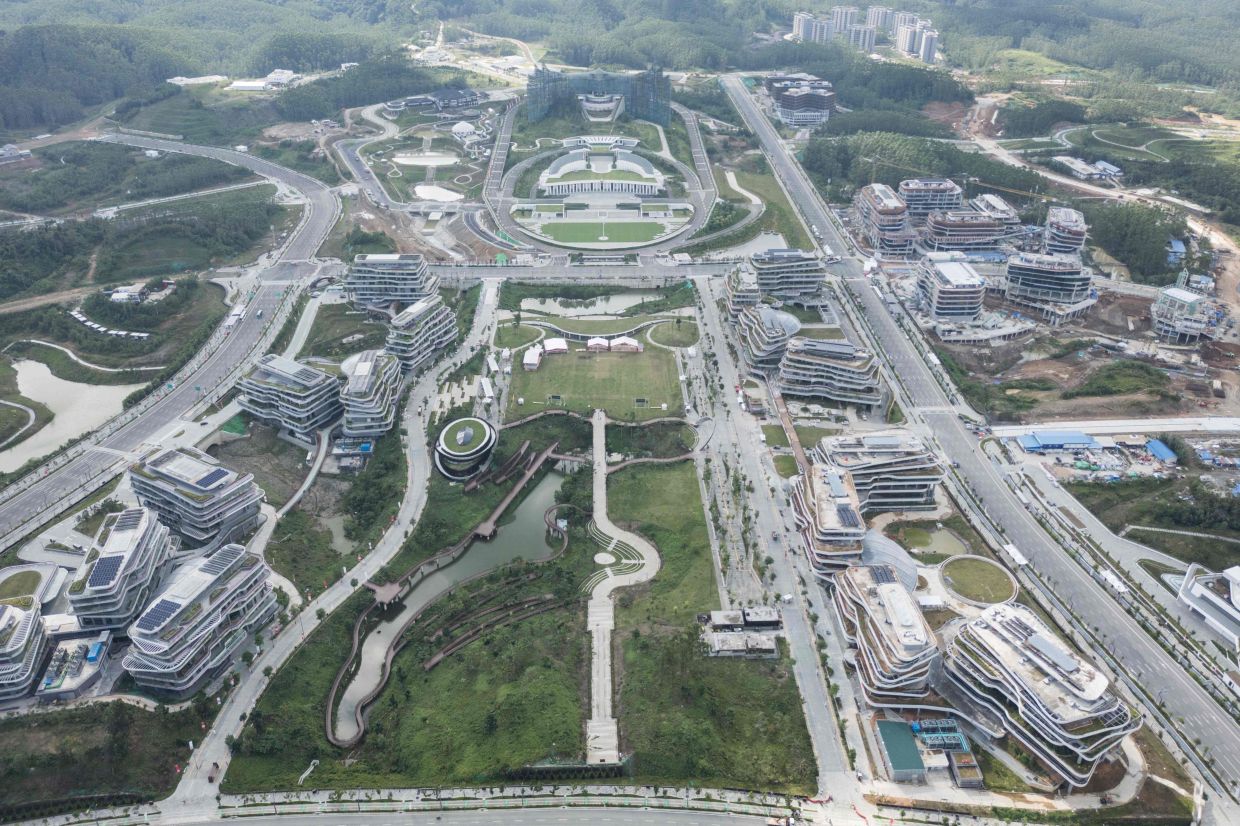 This aerial photo taken on August 15, 2025 shows the presidential palace and government ministry buildings under development in Ibu Kota Nusantara (IKN), the planned new capital of Indonesia, in East Kalimantan. (Photo by AFP)