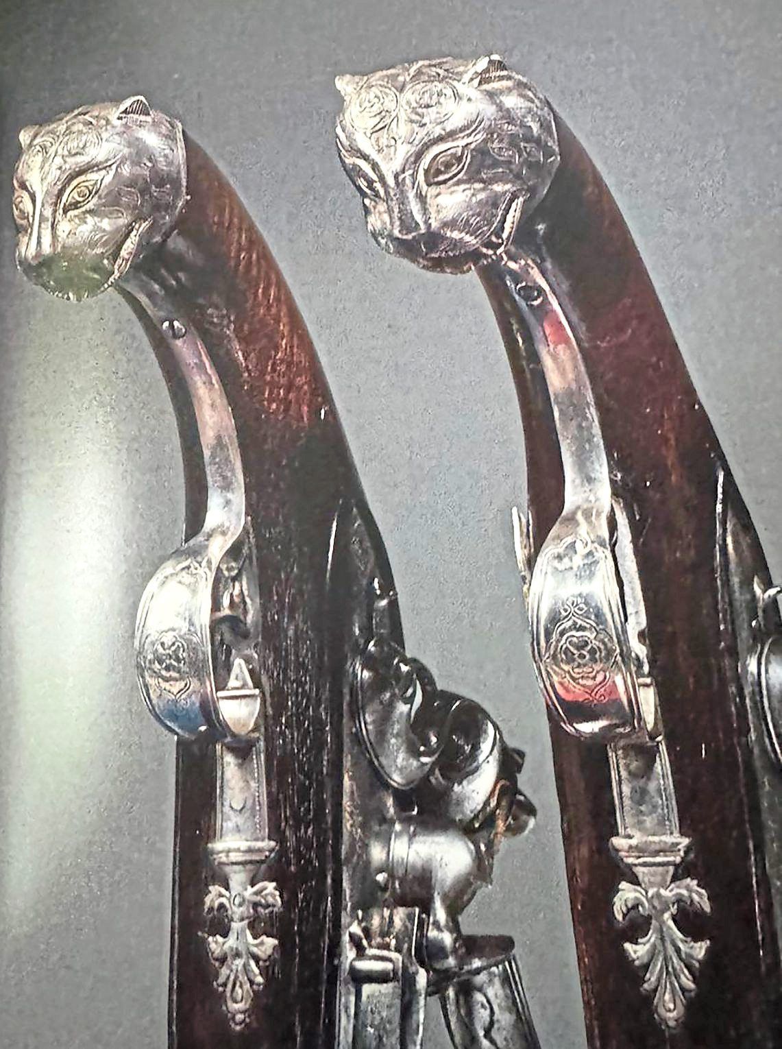 Rare heritage: A pair of flintlock pistols with a snarling tiger design on their buttcaps belonging to Tipu Sultan are part of the IAMM exhibition. — Photos: IAMM