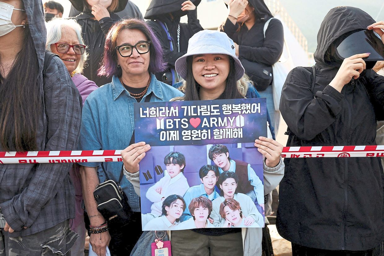 K-pop frenzy: BTS fans waiting for BTS members Jungkook and Jimin who were set to be discharged from South Korea’s mandatory military service, in Yeoncheon, South Korea, on June 11. — Reuters/AFP