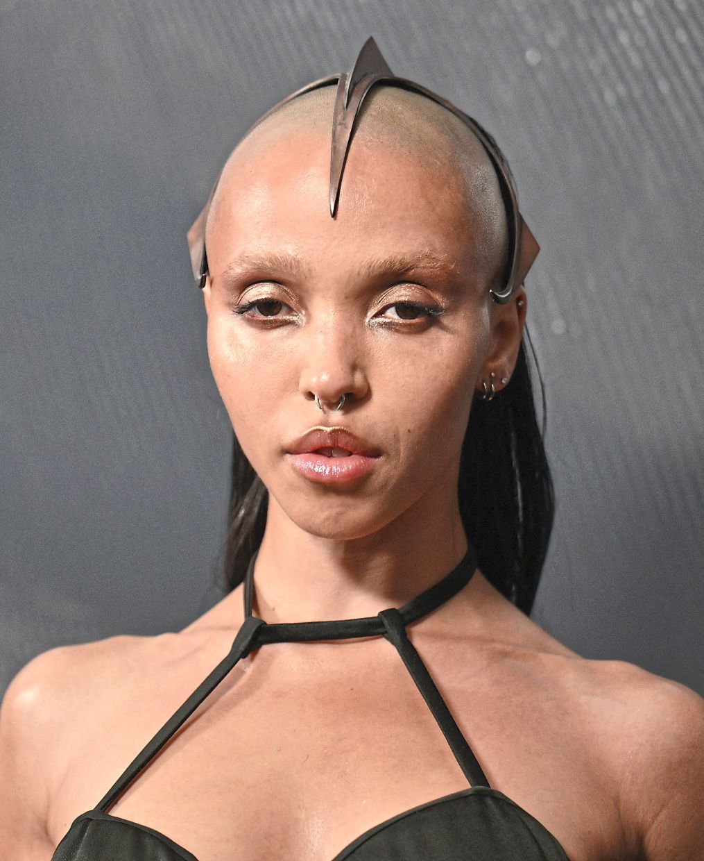 FKA Twigs loves to dress up her outfits with unusual accessories. Photo: AFP