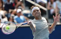 Tennis-Fritz, Shelton lead American charge at US Open with first-round wins