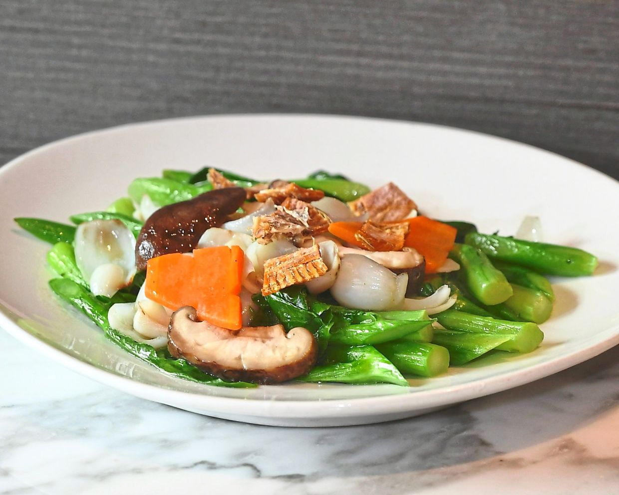 Stir-Fried Kailan with Fresh Lily Bulbs and Dried Halibut.