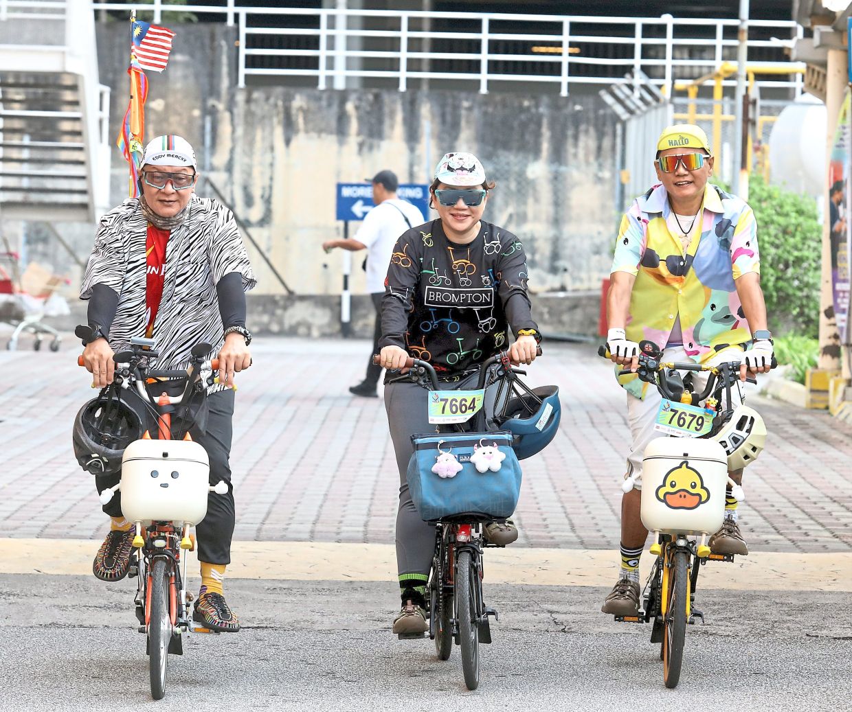 Tan (right) with friends wheeling about during the fun ride.