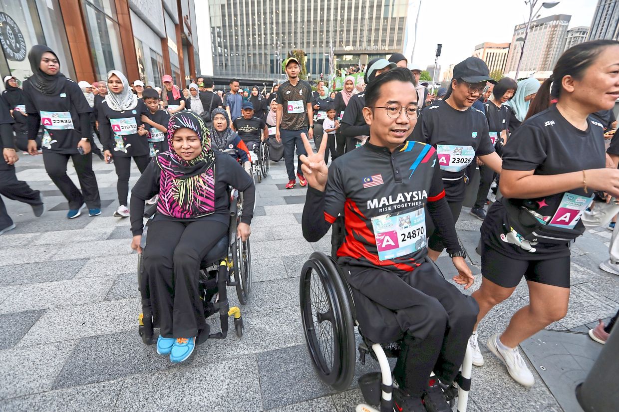 Participants in the Watsons fun run at the Tun Razak Exchange, Kuala Lumpur.