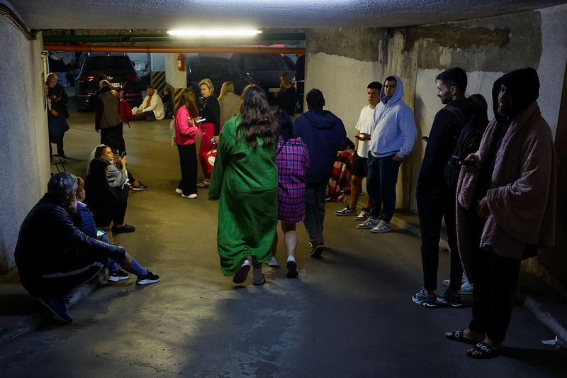 Three dead in mass night-time Russian attack on Kyiv, officials say