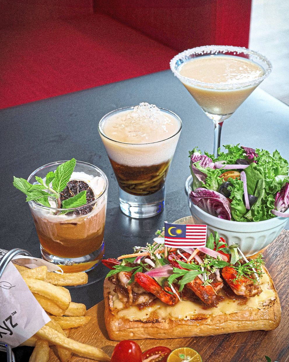 Mai Bar toasts to National Day with (from left) Harum Manis, Cendol and tiki Pandan.
