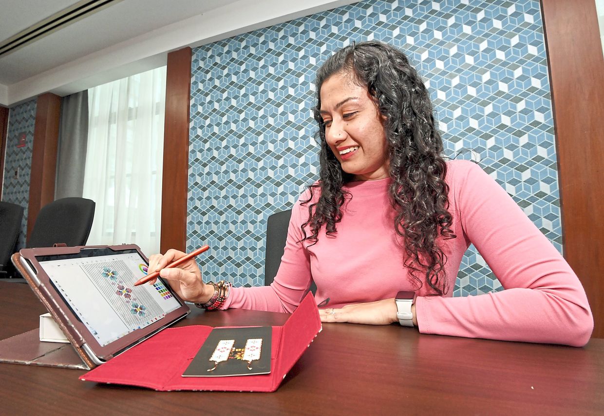 Sharmila sketches her earring designs digitally, using an app to bring her ideas to life.
