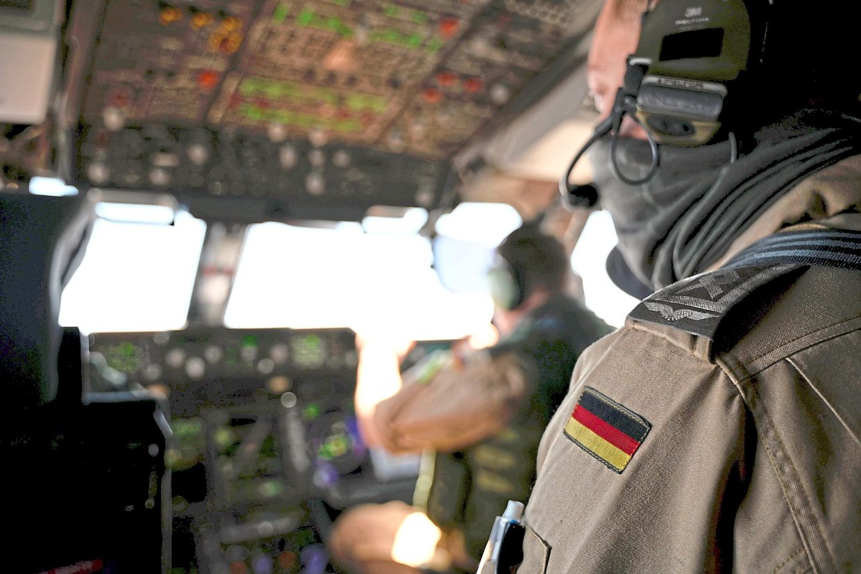 View of the cockpit before the departure of a German military Airbus A400M to drop aid supplies over the Strip. 
