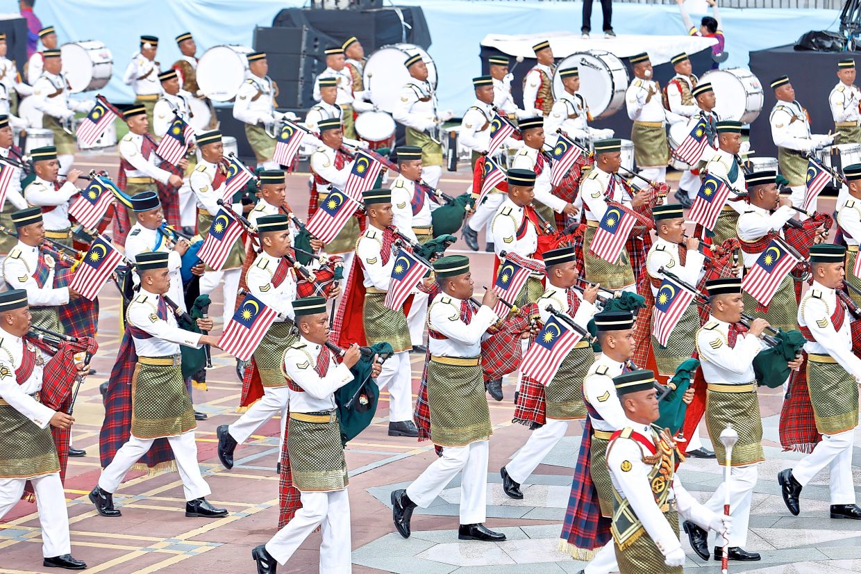 Bagpipe troupe practising their march-past during the rehearsal.