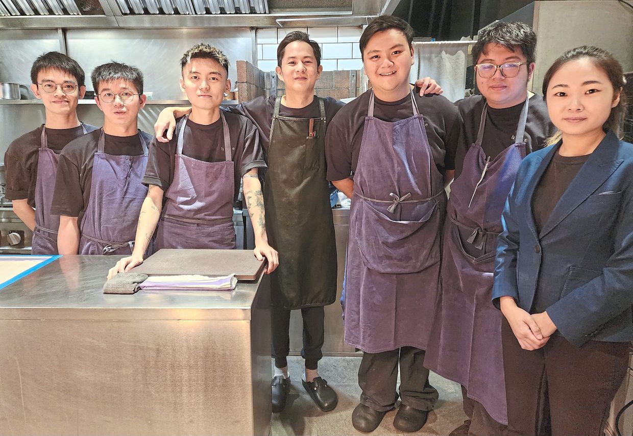 Ng (fourth from left) is the creative force behind Hide's familiar-yet-new offerings. — ABIRAMI DURAI/The Star