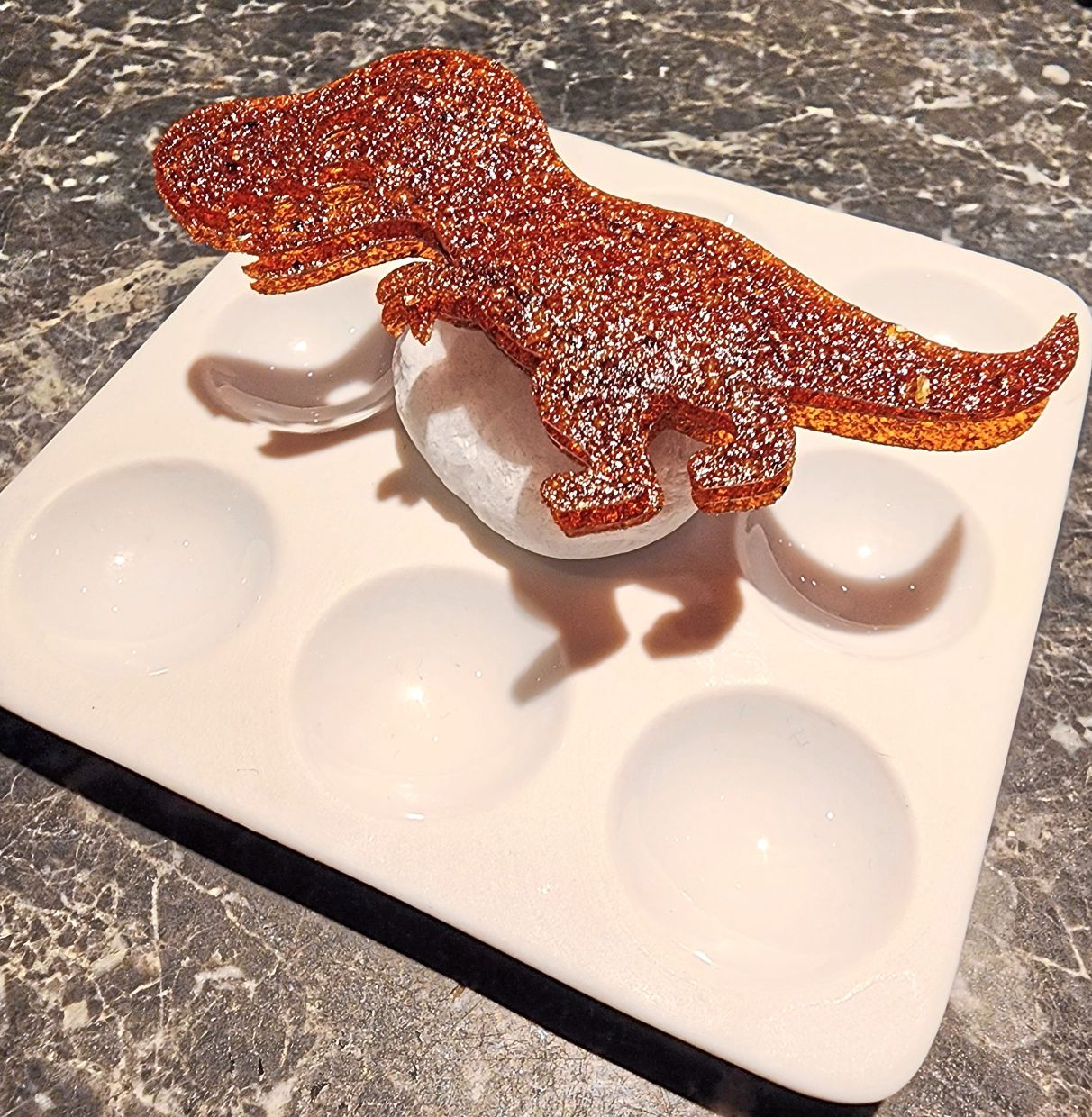 The meal opens on a playful note with a dinosaur cracker stuffed with budu cream cheese. — ABIRAMI DURAI/The Star