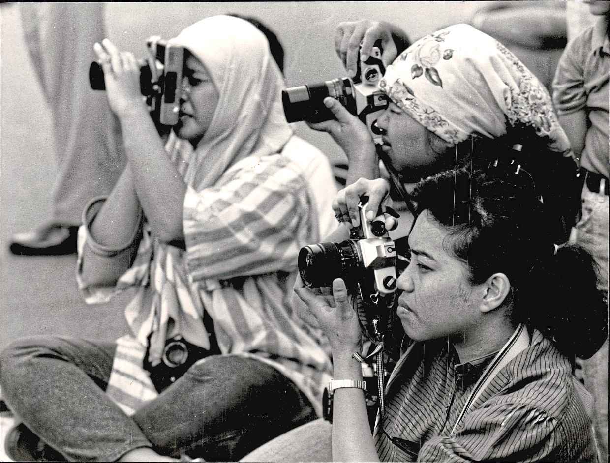 The Star photographer SS Kanesan captured this moment of photography students honing their skills during the Merdeka parade in Kuala Lumpur.