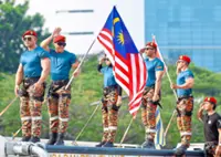 Crowds swoon as uniformed hunks flex their muscles