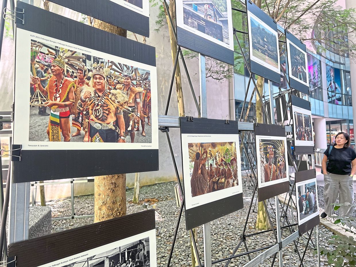 A visitor to the ‘Pelbagai Bangsa, Pelbagai Budaya — Nadi Warisan Malaysia’ exhibition. — Photos: ADANI ZAIDI/The Star and courtesy photos
