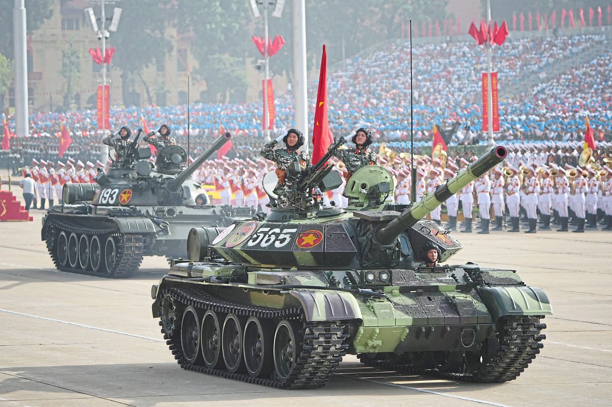 Vietnamese tank take part during a parade celebrating the 80th anniversary of independence in Hanoi, Vietnam, September 2, 2025. Vincent Thian/Pool via REUTERS