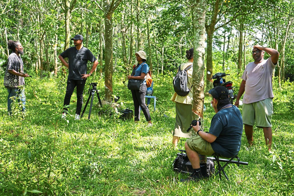 A behind-the-scenes glimpse of the documentary, filmed on a Melaka estate. For the project, the team visited 15 estates across Peninsular Malaysia. Photo: Om Sakthi Films