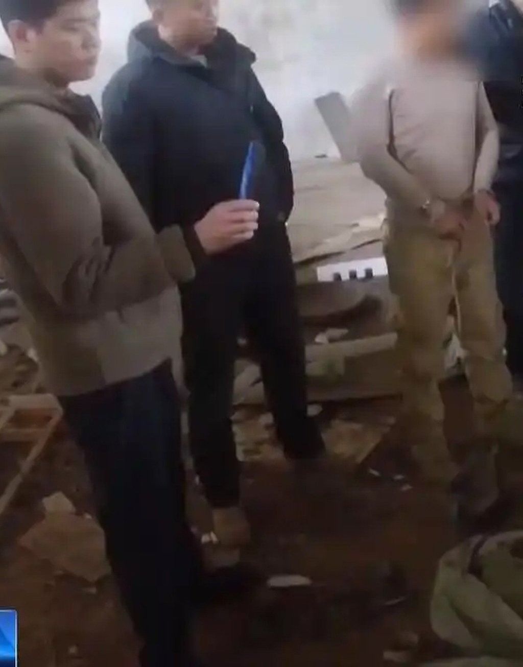 Criminal mastermind Yu in handcuffs. He and his accomplices have been jailed and fined. - Photo: CCTV