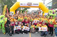Sarong-clad runners race for durian glory