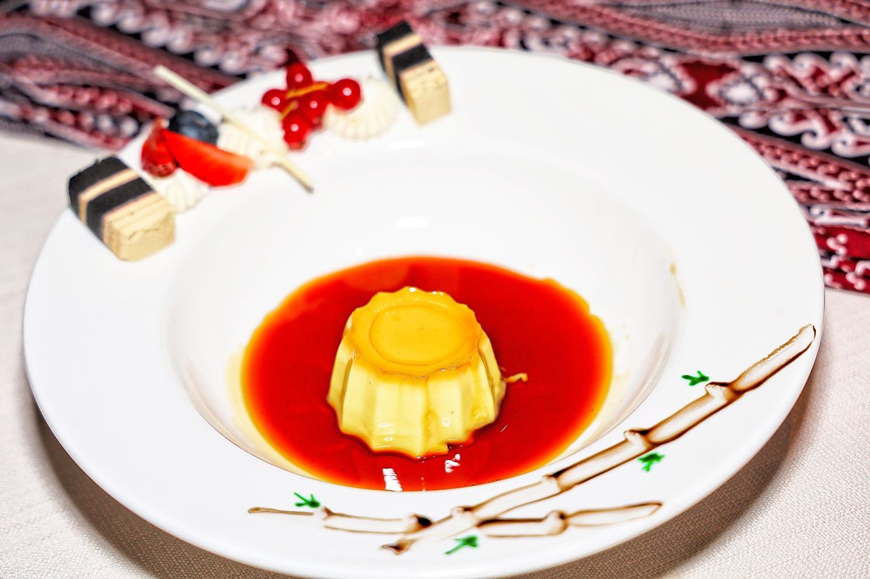 Indulgent Cream Caramel Gula Apong and (arranged on the plate’s edge) Kek Lapis Sarawak.