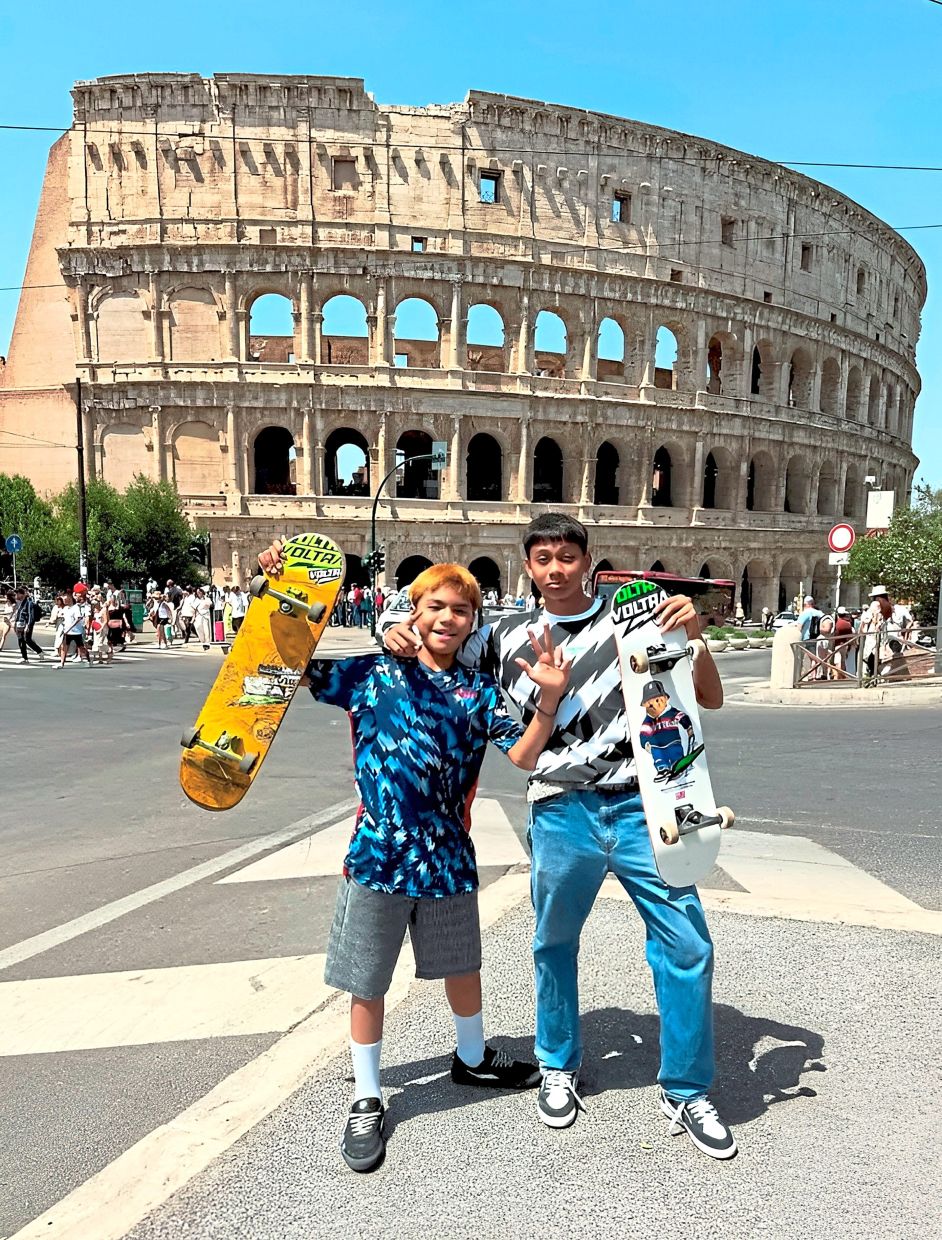 Mahathir (right) and Mer posing for a picture in front of the Colosseum during the World Skateboarding Tour World Cup Rome in Italy. — Courtesy photos