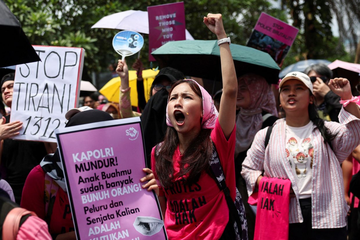 Activists shoutingslogans during a protest against lawmakers' perks and police brutality, outside the Indonesian parliament building in Jakarta on Sept 3, 2025. - Reuters