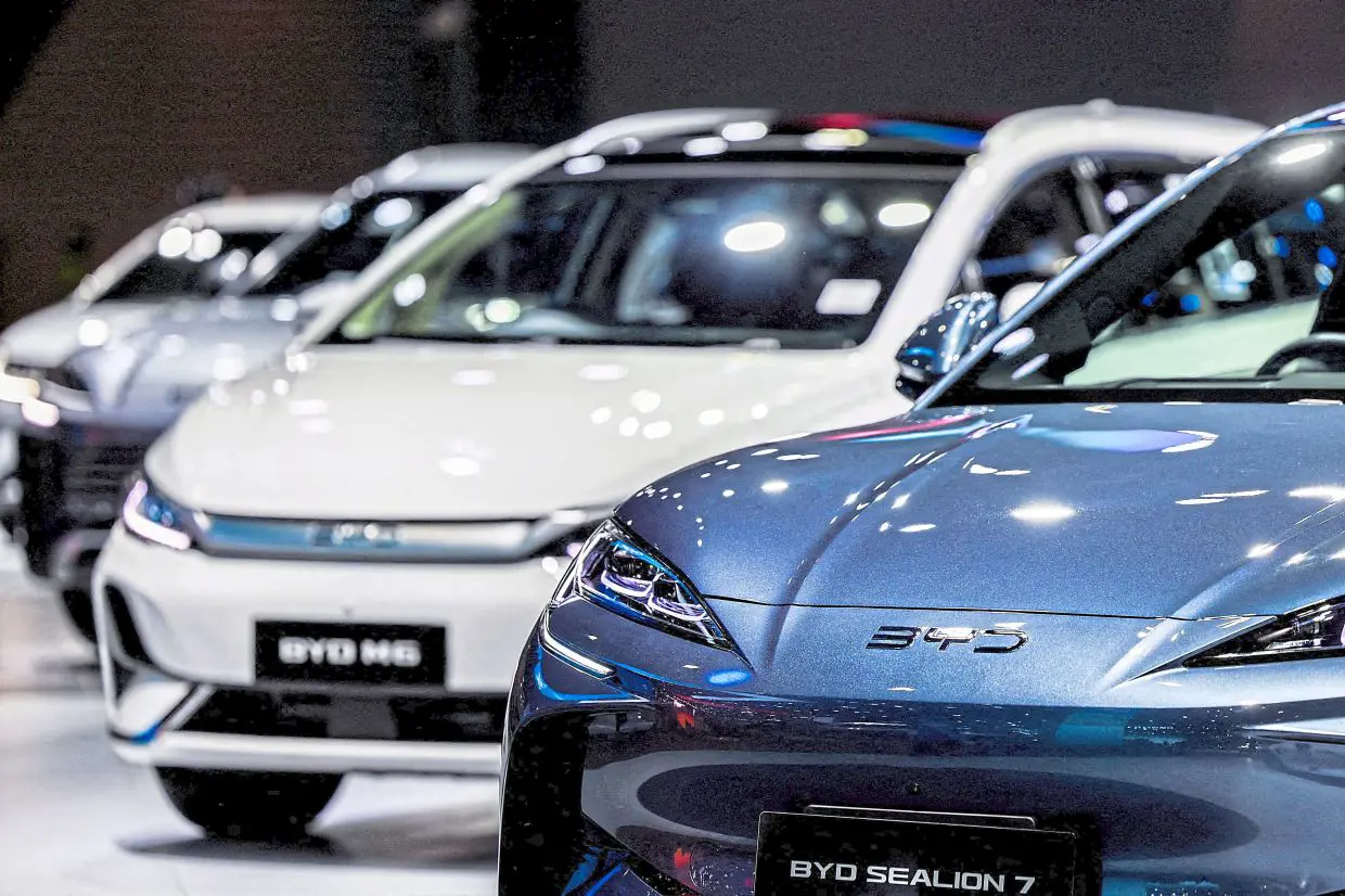 China's BYD cuts 2025 sales target by 16%, sources say, a sign its white-hot  growth is cooling | The Star