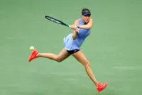 Tennis-Anisimova moves past Wimbledon agony to upset Swiatek in US Open quarters