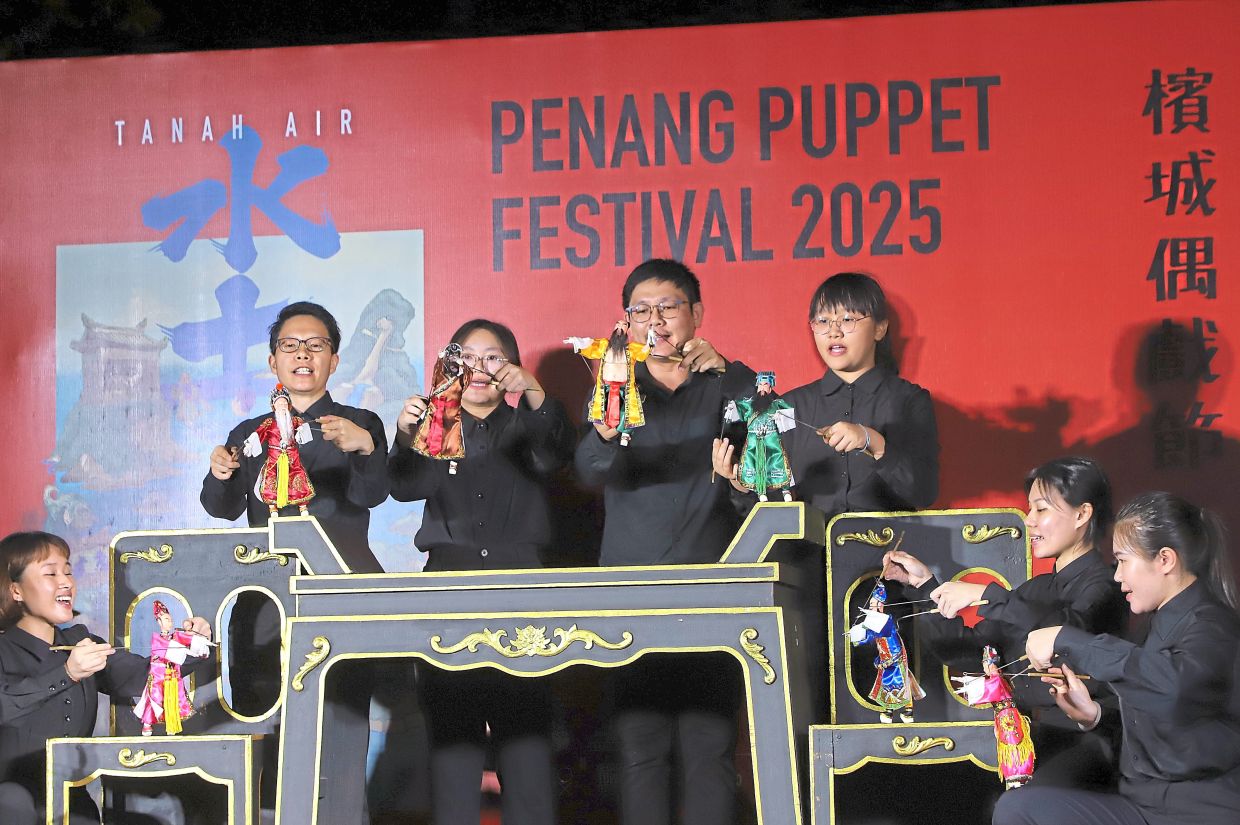 Performance by the Iron Gang Puppet Troupe from Penang.