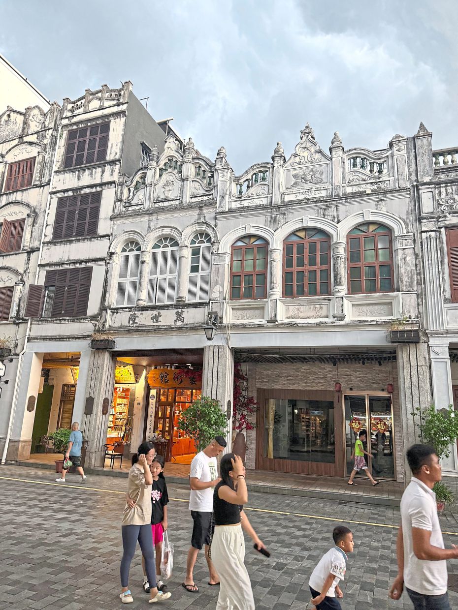 Haikou’s Qilou Old Street is a charming town with colonial-style buildings.