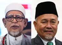 Hadi, Tuan Ibrahim retain PAS top posts unopposed