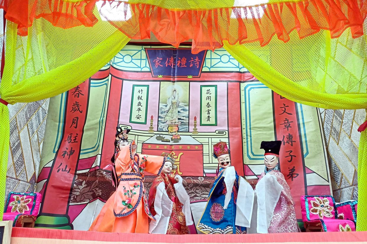 Glove puppetry is among shows during the Hungry Ghost Festival celebrations.