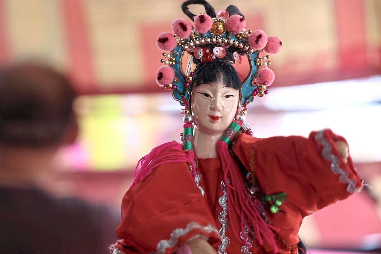 A closeup of a glove puppet.