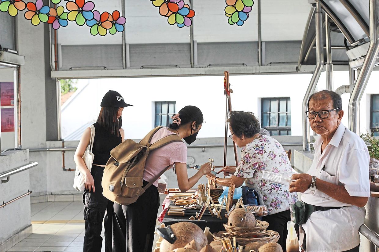 Local vendors enjoying good business at the pop-up market. 