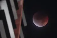 Blood moon rises during total lunar eclipse, but Singapore stargazers’ view hampered by clouds