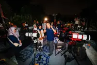 National Planetarium's blood moon event draws crowds, despite overcast skies