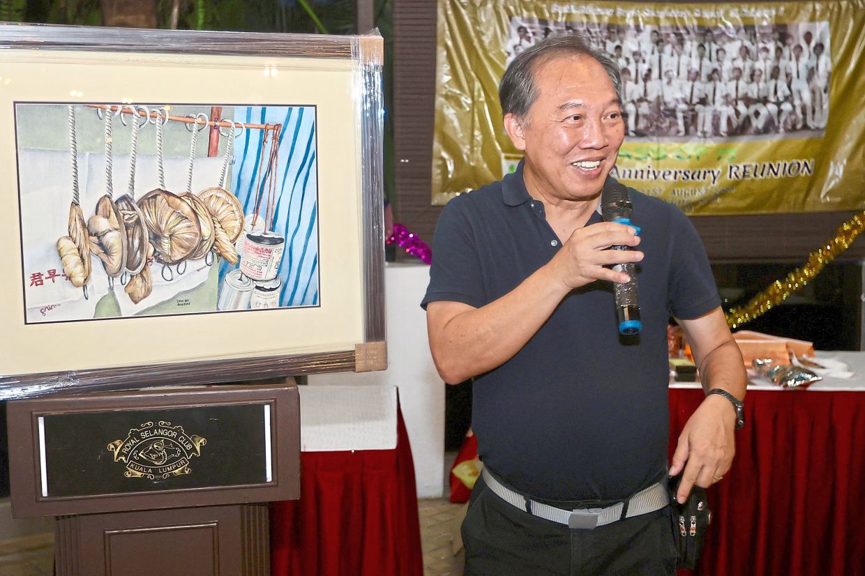 Liew auctioning one of his original paintings for charity.