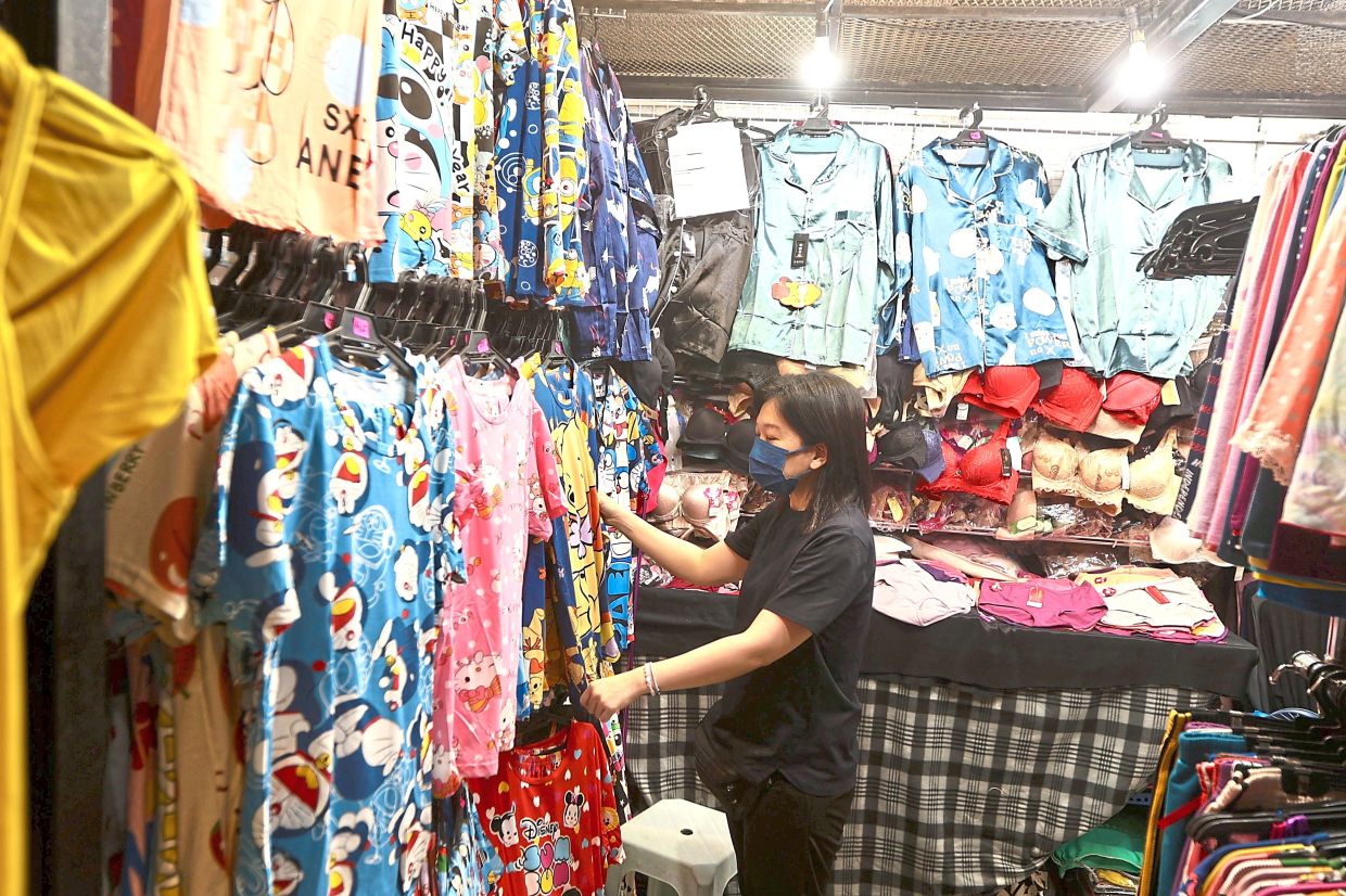 Chong says despite having a smaller space, the complex is a shopping haven for customers and shelter for traders.