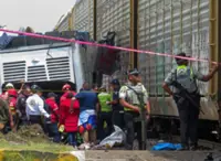 Ten people killed, 61 hurt after Mexican train hits double-decker bus
