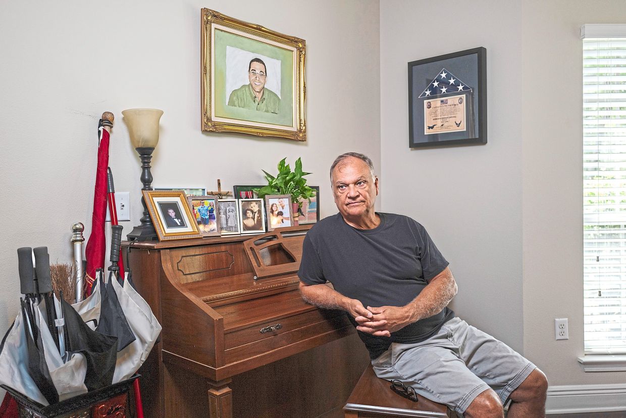 Still waiting: Arias’ younger brother Adam (in picture above him), who worked for an investment company at WTC, was killed in the 9/11 attacks. — Micah Green/The New York Times