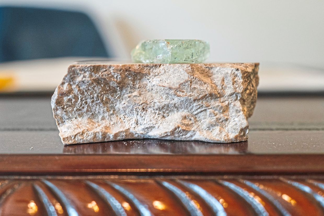 Arias can only hold on to pieces from WTC as a remembrance of the tragedy. — Micah Green/The New York Times